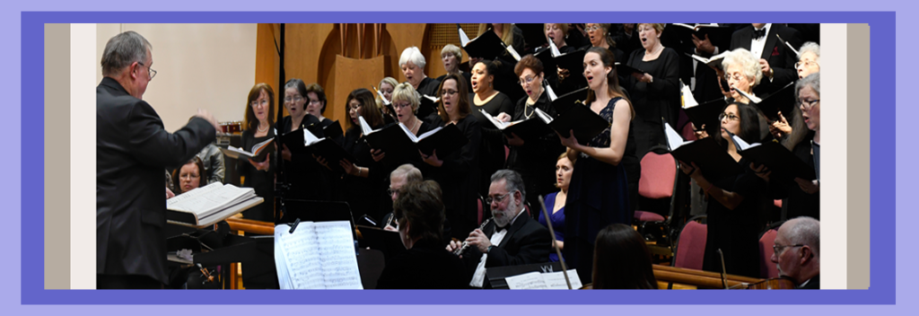 Artistic Director Bob Webb conducts the chorale in "We Remember Them," November of 2017.
